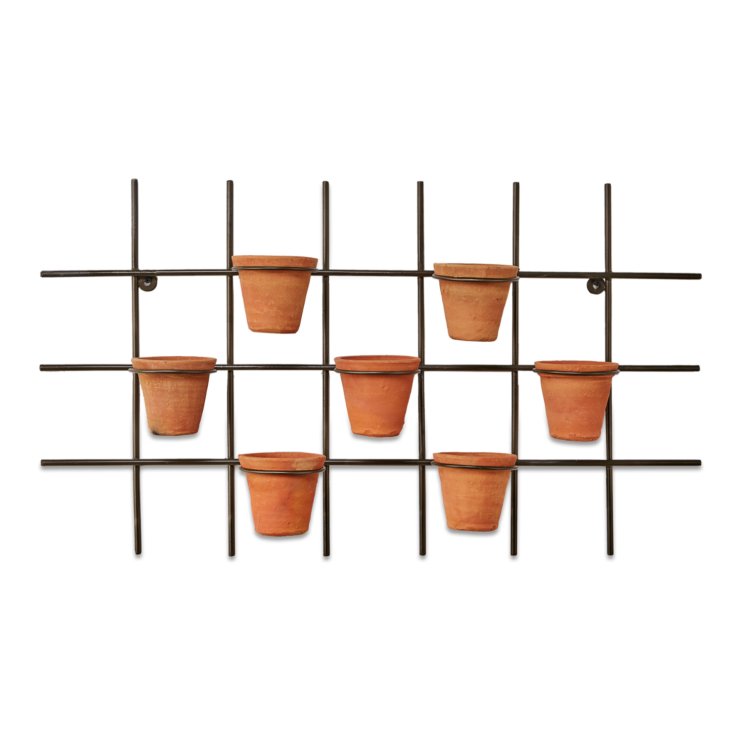 A terracotta wall hung planter set up by Nkuku