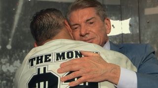 Vince hugging Shane McMahon in Mr. McMahon