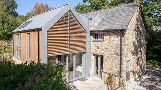 contemporary two storey extension with zinc roof