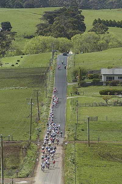 The peloton stretch out with a group of four drifting off the front around 15 kilometres from the start to stage five in Smithton.