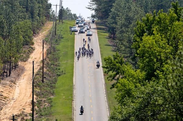 A crash in the women's field slows things up at the back.