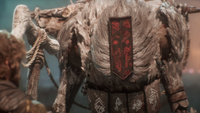 Monoco from Clair Obscur: Expedition 33 stares with an unassailable masked expression.