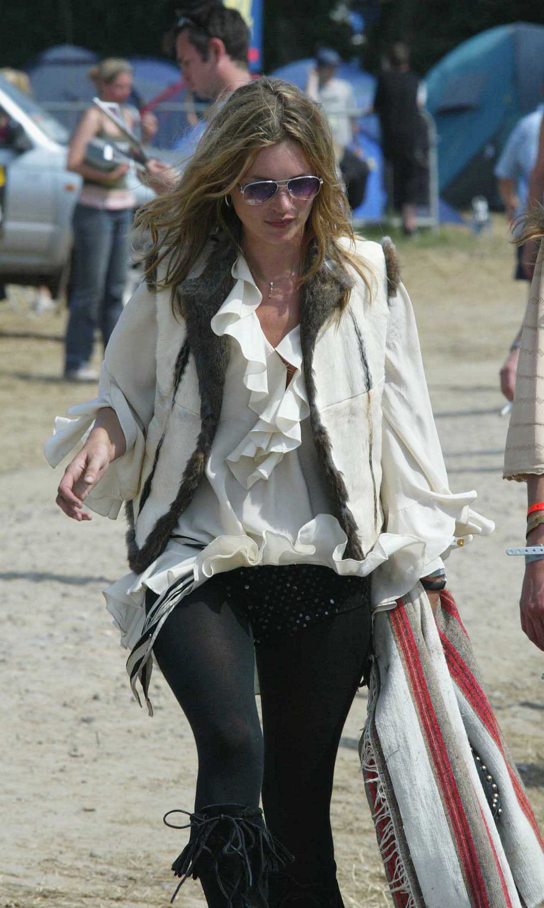 Kate Moss strolling around The Glastonbury Festival 2003