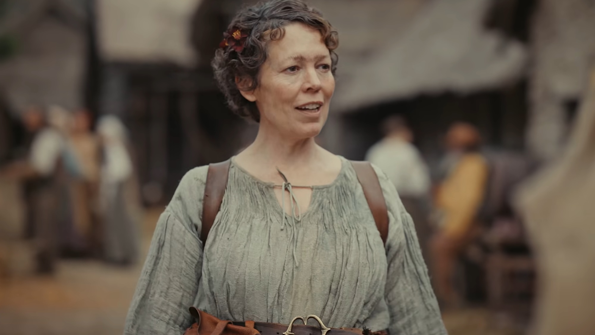 Olivia Colman standing outside in Wicker