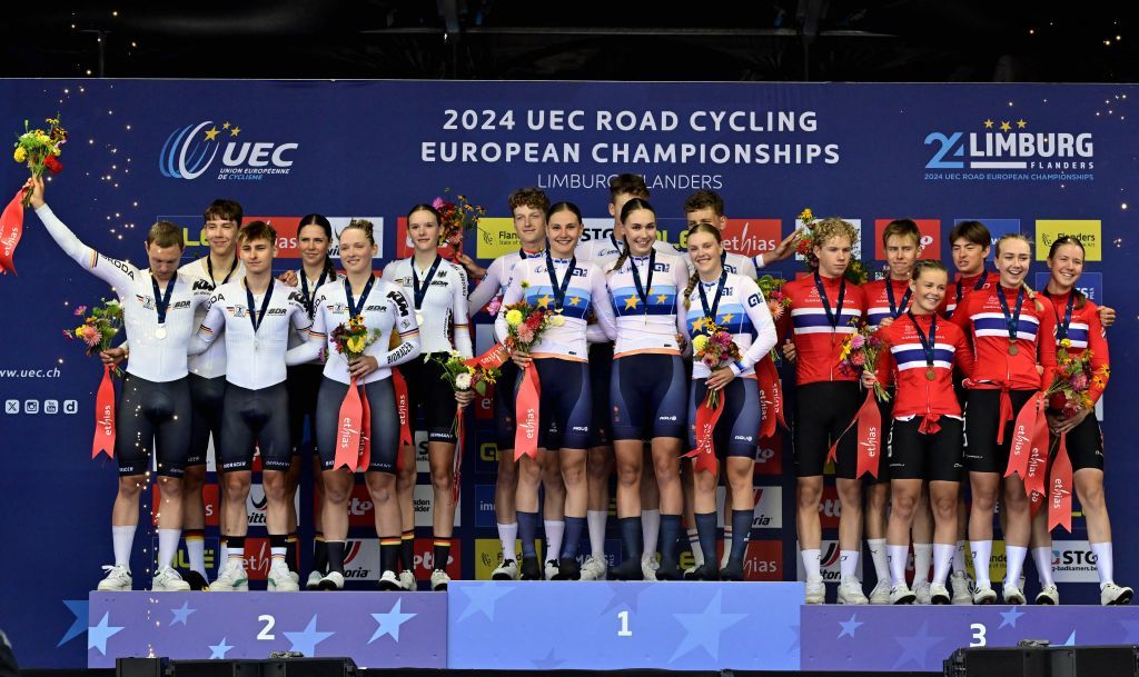 Germany Male team Paul Fietzke, Ian Kings and Paul -Felix Petry, Germany Female Team Messane Brautigam, Magdalena Leis and Joelle Amelie Messemer , winner of the silver medal, Netherlands Male team Michiel Mouris, Joeri Schaper and Gijs Schoonvelde, Netherlands Female Team Jente Koops, Roos Muller and Sara Sonnemans , winner of the gold medal, Norway Male team Marius Innhaug Dahl, Andreas Flaatten and Felix Orn-Kristoff and Norway Female Team Kamilla Aasebo, Mia Gjertsen and Matilde Skjelde , winner of the bronze medal pictured on the podium of the time trial mixed relay juniors at the European Championship 2024, in Hasselt, Thursday 12 September 2024. The UEC Road European Championships 2024 will take place from 11 to 15 september in Limburg, Belgium. BELGA PHOTO DIRK WAEM (Photo by DIRK WAEM / BELGA MAG / Belga via AFP)