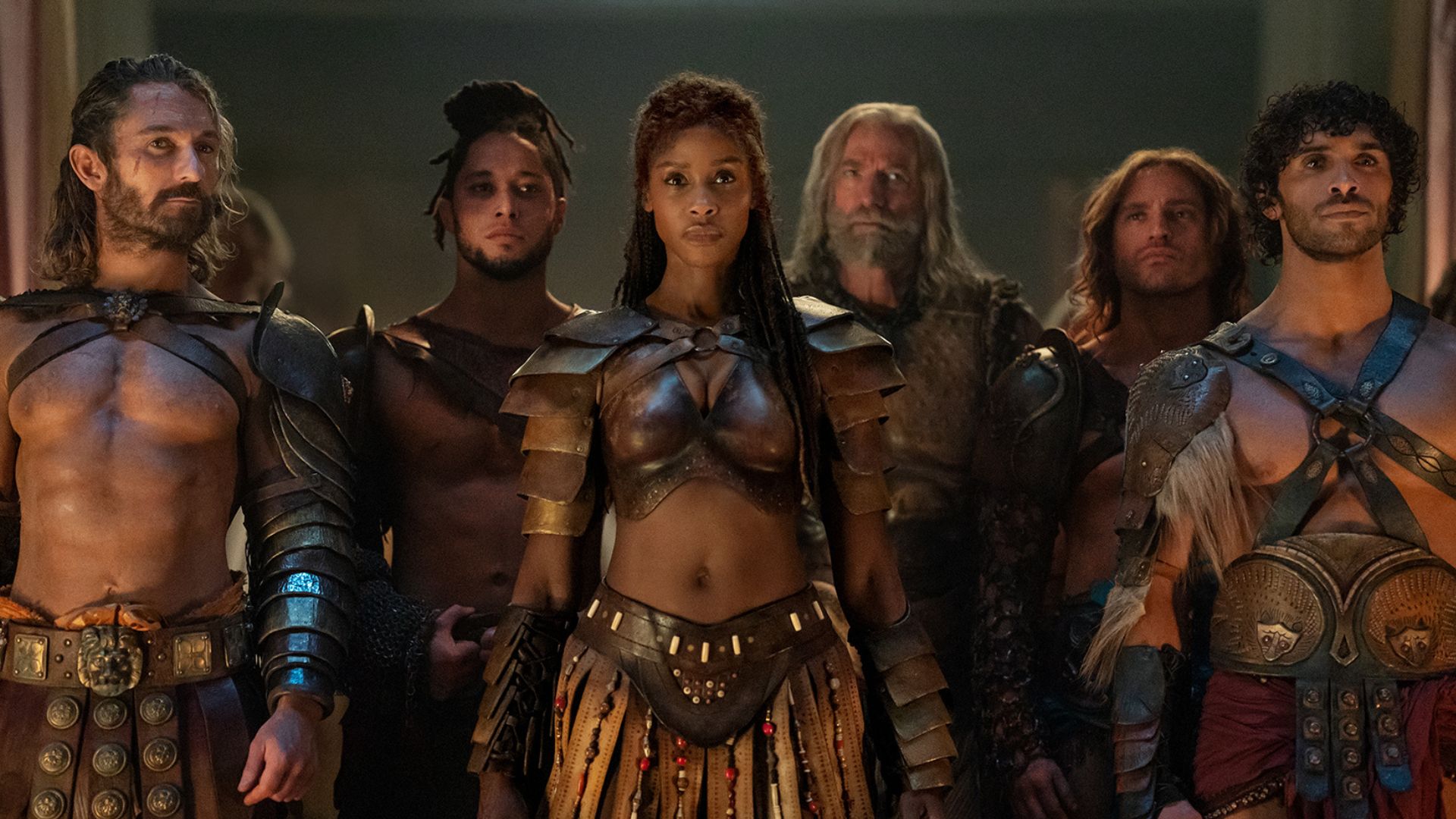 Achillia leads a group of male gladiators