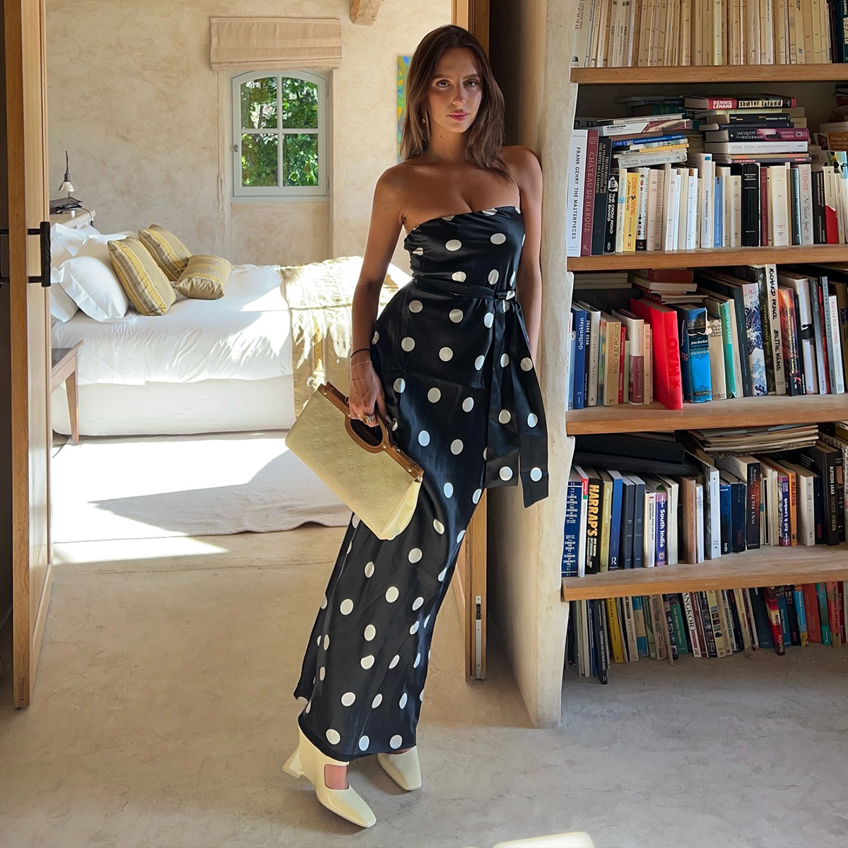 woman wearing polka dot dress for a spring baby shower