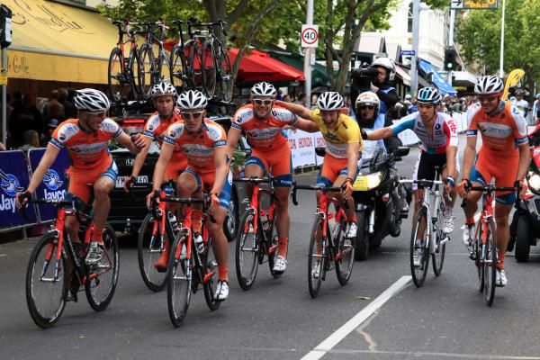 Nathan Haas (Genesys Wealth Advisors) is accompanied by his teammates