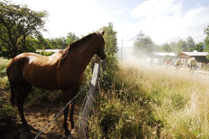 Life goes on in Chile as racers whiz by