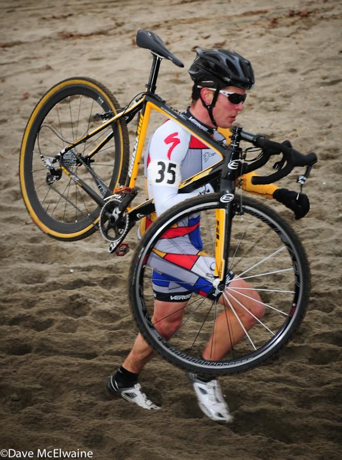 Matthew Means (C3 Twenty 20) running in the deep sand at the beach