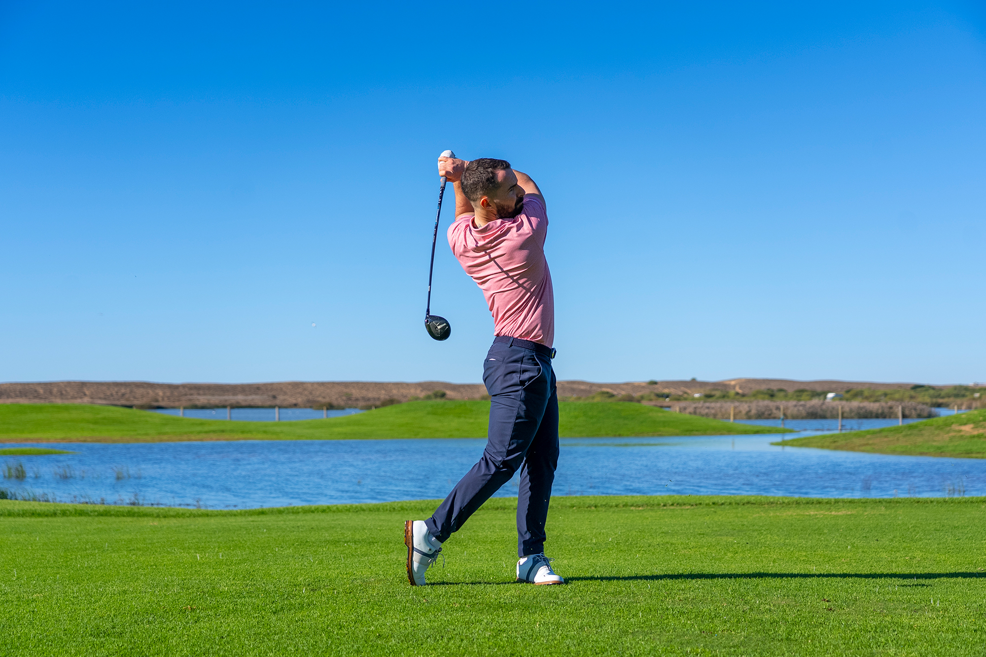 James Jankowksi demonstrating his expertly crafted golf swing, devised and sculpted over years of playing and coaching as a PGA professional