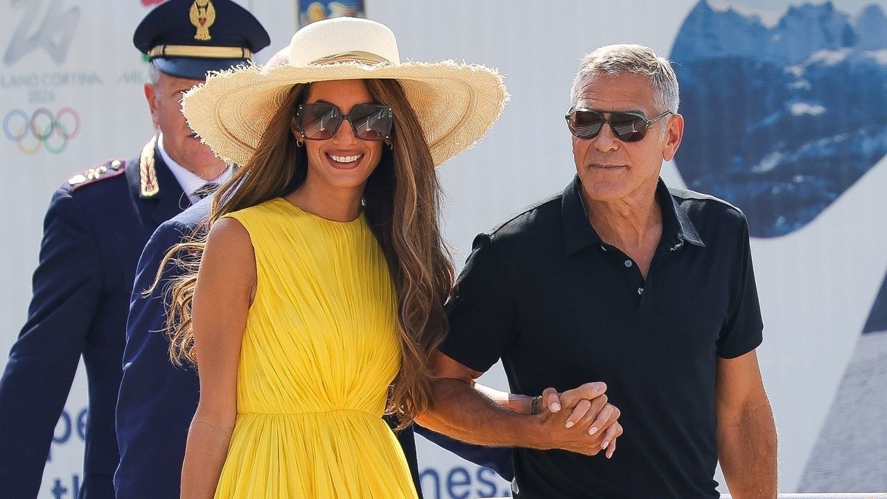 George Clooney and wife Amal are seen arriving at Marco Polo Airport in Venice for the 81st Venice International Film Festival.