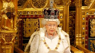 Queen Elizabeth II reads the Queen's Speech from the throne during State Opening of Parliament