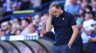 Chelsea manager Thomas Tuchel holds his head during the Blues' 3-0 loss to Leeds.