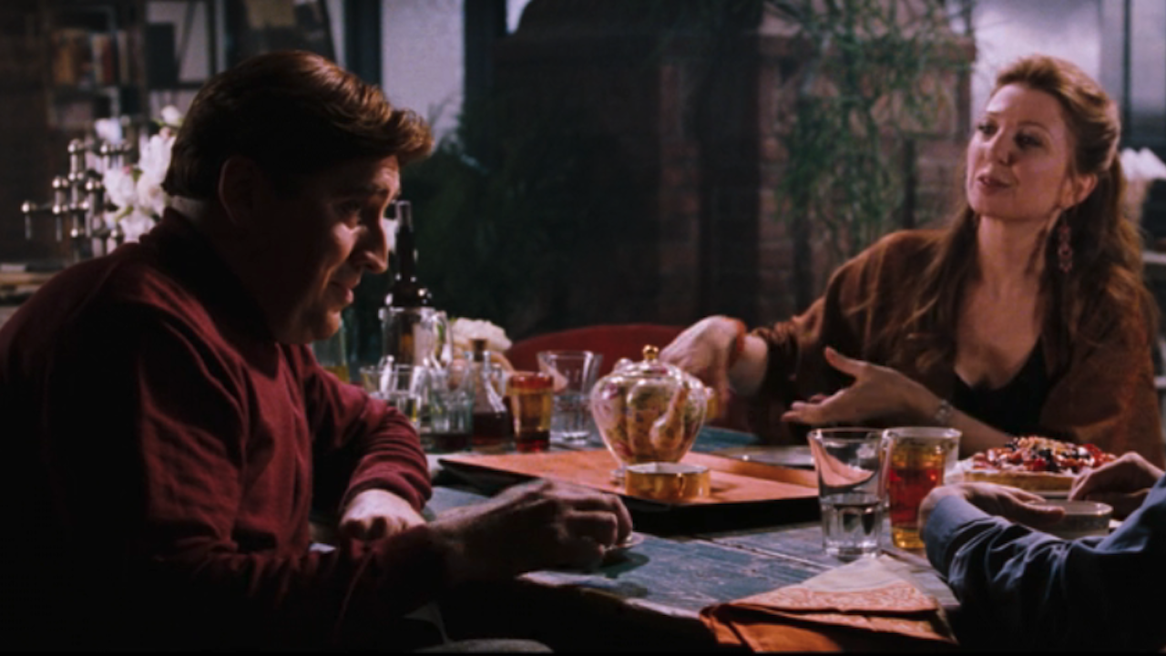 Otto and wife talking to Peter in Spider-Man 2