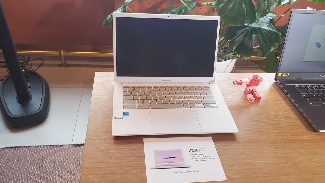 Chromebook Plus laptop on wooden table