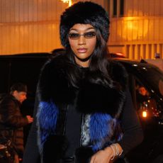 Angel Reese attended a NBA game in Germany wearing a leather and fur winterwear look