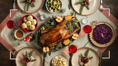 A selection of healthy Christmas foods on table spread with decorations