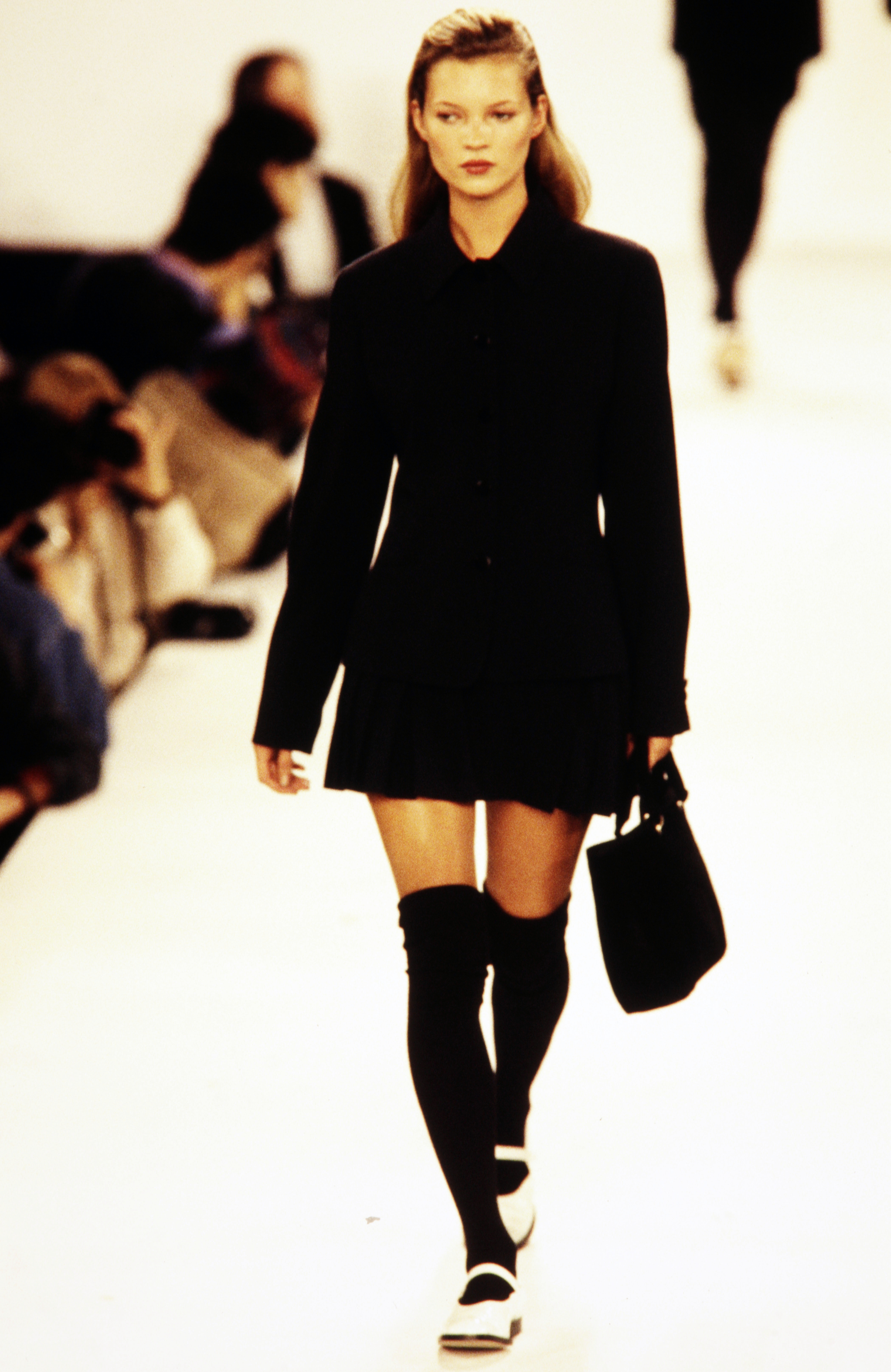 Model Kate Moss walks in the CK Calvin Klein Fall 1994 Ready to Wear Runway Show on April 10, 1994, in New York City.