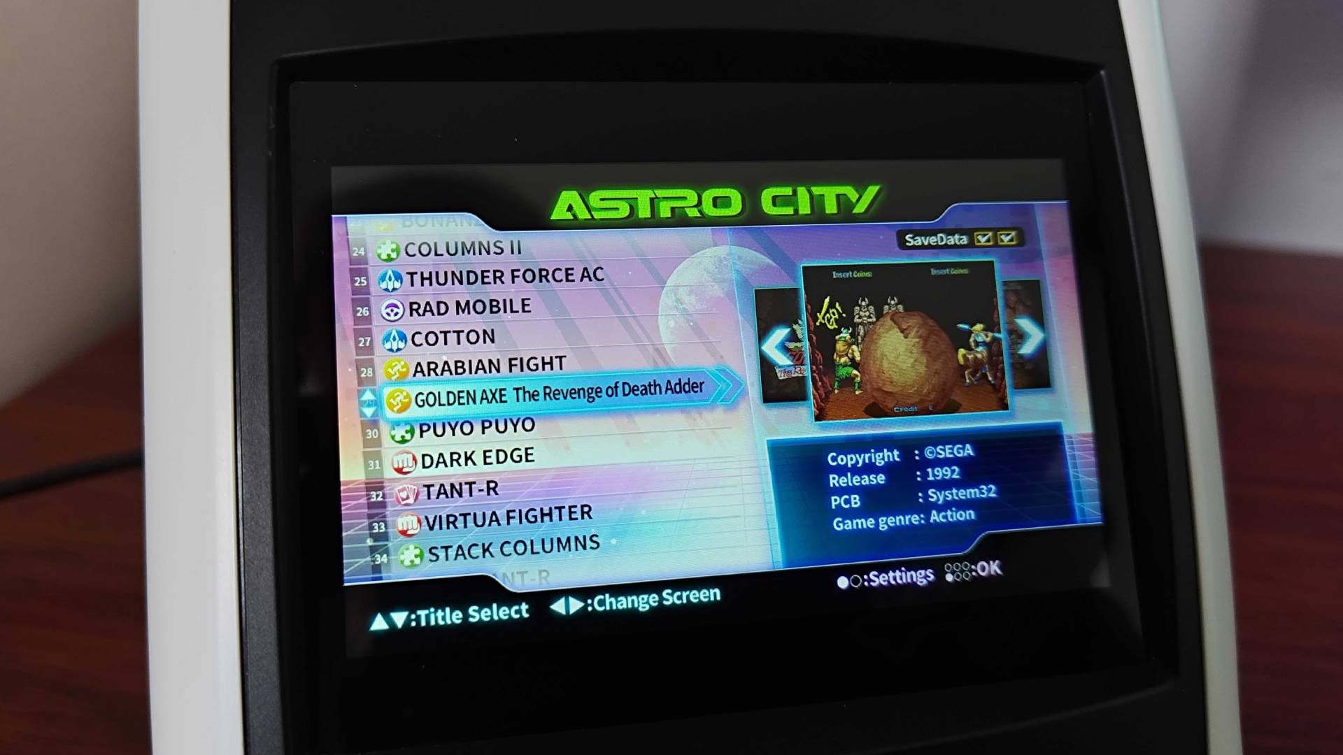 Close up of Sega Astro City Mini screen and game list.