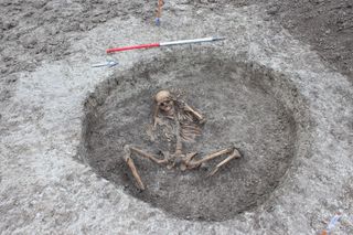 One of 26 human skeletons recently revealed during digging for a water-pipeline project in Oxfordshire, England: Local archaeologists believe many of the skeletons date to the Iron Age and may have been buried in a ritualistic manner.