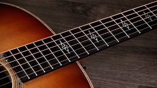 A photo of Taylor’s Gold Label 814e SB Super Auditorium in sunburst finish