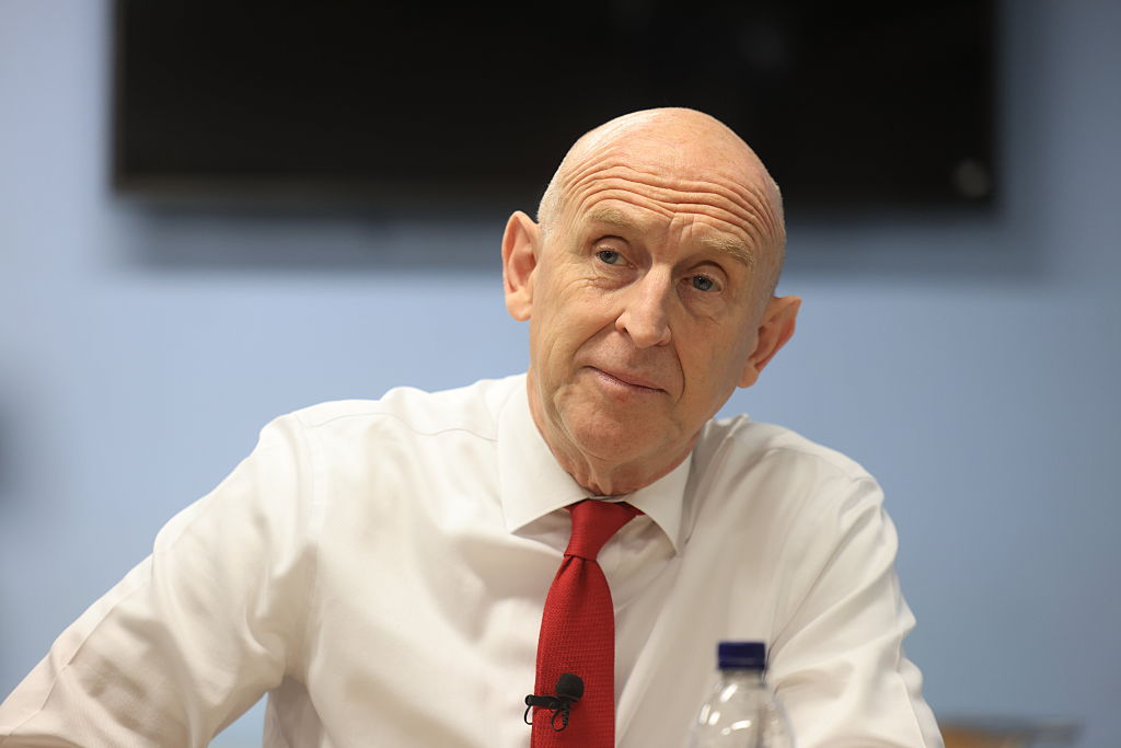 Chancellor John Healey speaks to service users during a visit to St Martin-in-the-Fields Charity on October 26, 2026 in London, England