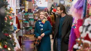 Emily Tennant, Niall Matter shop in a store in Holiday Hotline