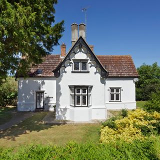 exterior of house with white walls and clay roof tiles