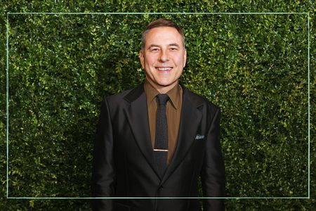 David Walliams posing at a BAFTAs after party