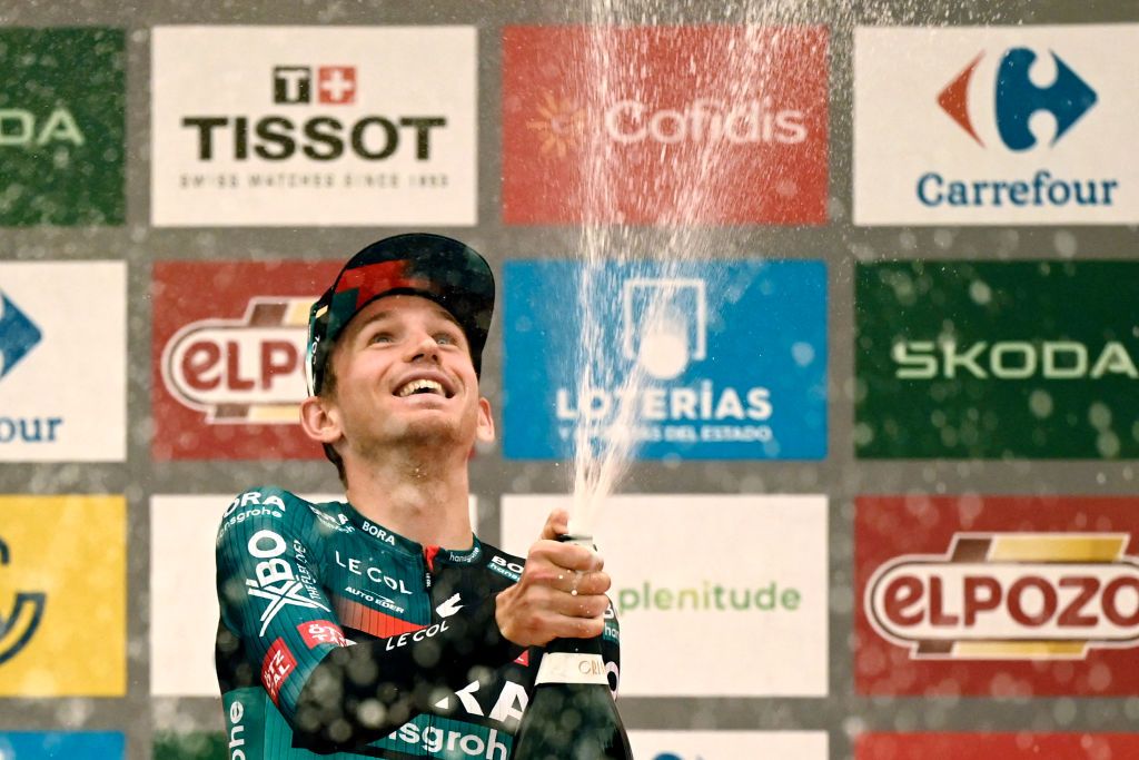Stage winner Lennard K&auml;mna (Bora-Hansgrohe) celebrates on the podium