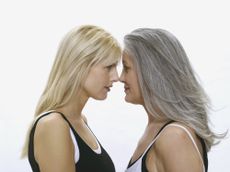 mom and daughter facing off