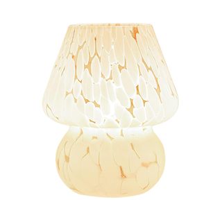 A yellow-hued mushroom lamp on a white background.