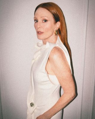 An image of Julianne Moore with copper hair.