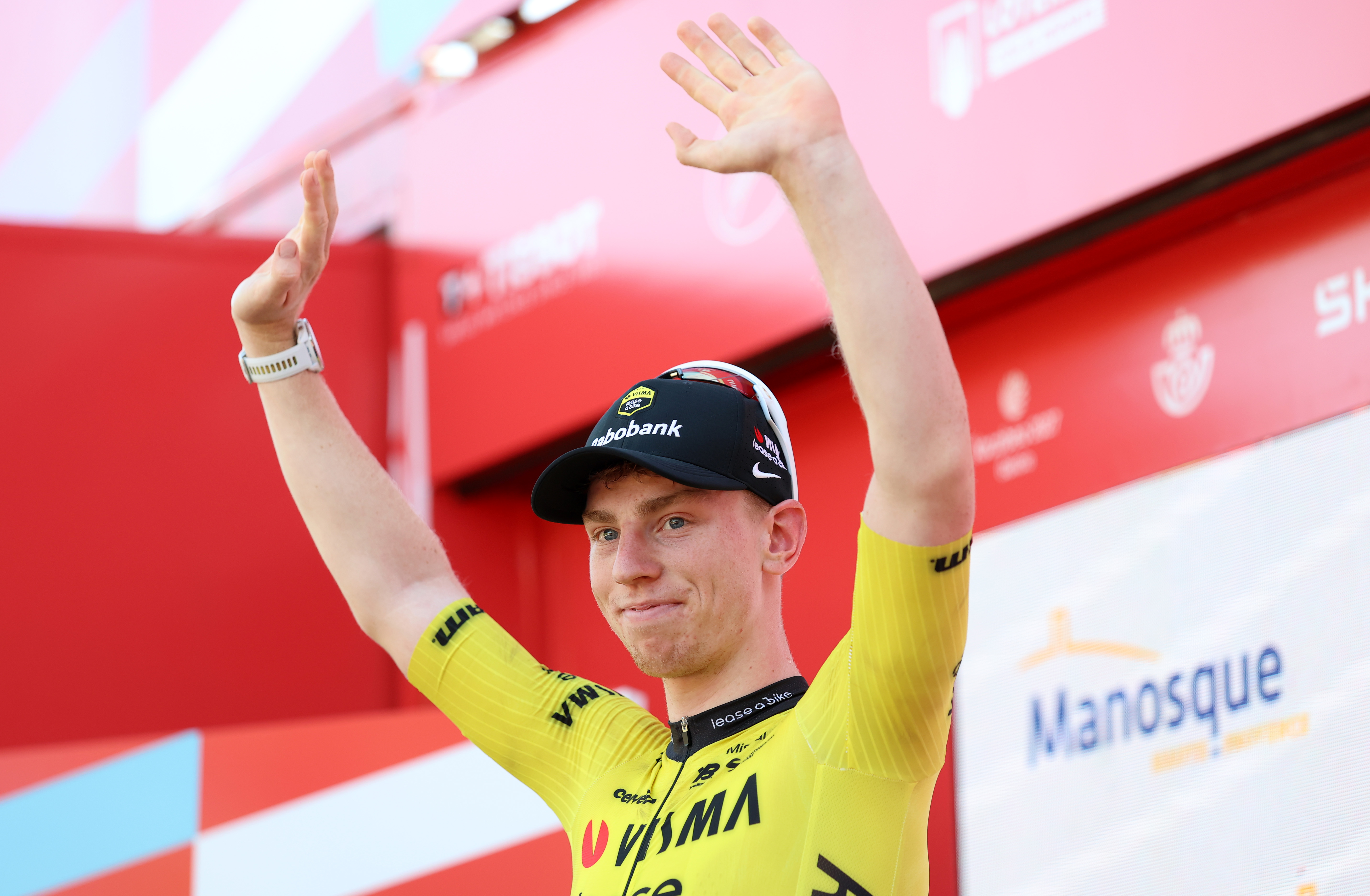 MANOSQUE, MONACO - AUGUST 23: Matthew Brennan of Great Britain and Team Visma | Lease a Bike celebrates at podium as stage winner during the La Vuelta - 81st Tour of Spain 2026, Stage 2 a 214.3km from Monaco to Manosque 408m / #UCIWT / on August 23, 2026 in Manosque, Monaco. (Photo by Alexander Hassenstein/Getty Images)