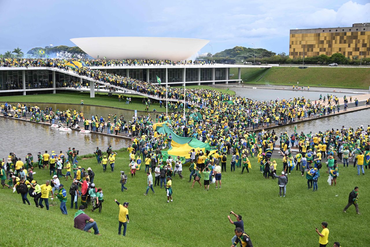 Supporters of former President Jair Bolsonaro storm the seat of government in Brazil. 