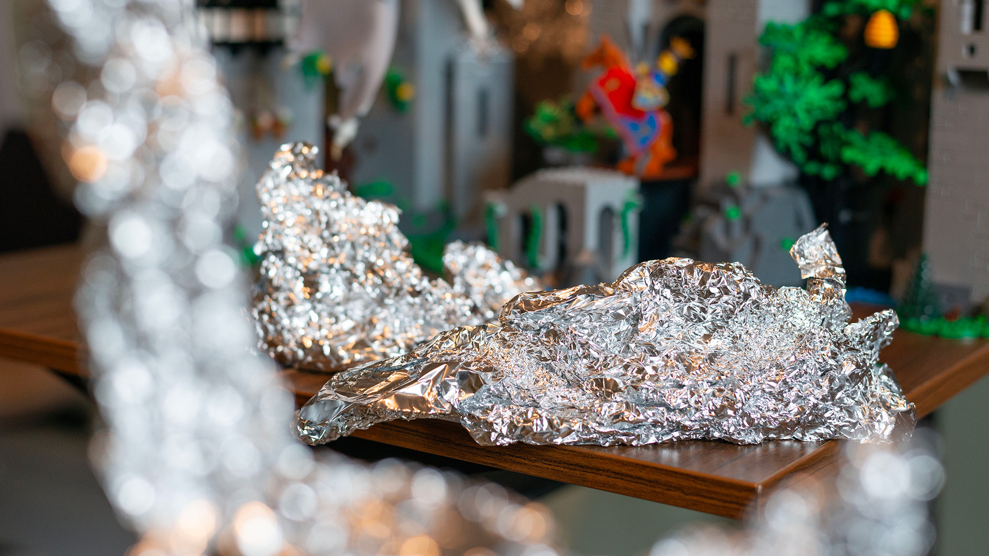 Scrunched up aluminum foil in foreground and midground