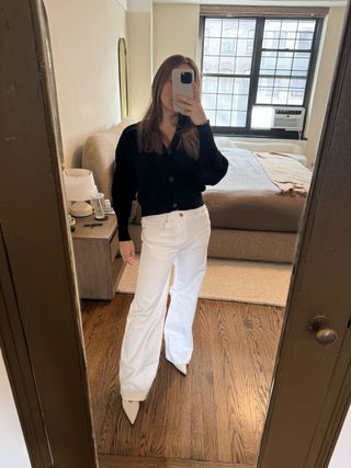 Nikki wears a white wide-leg jeans from H&M