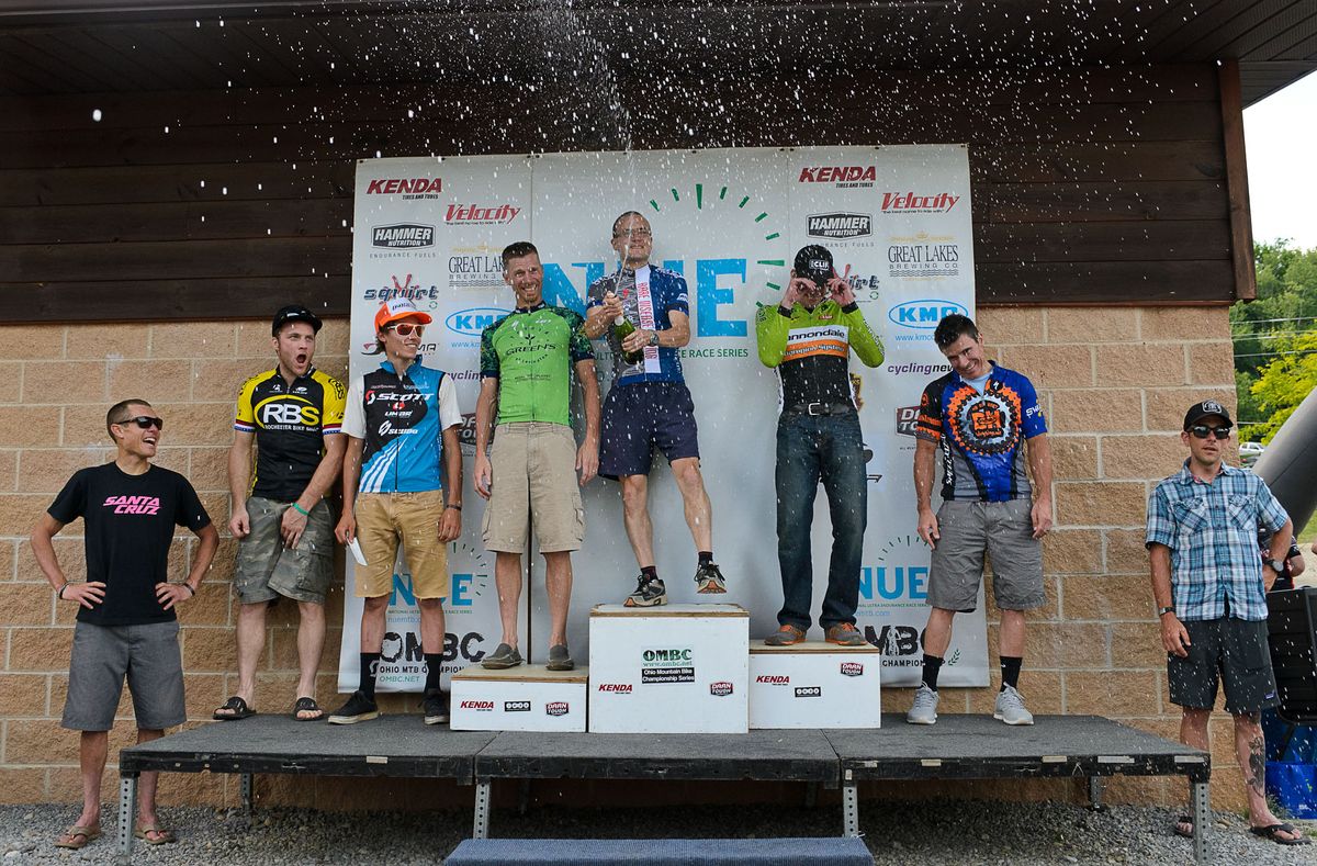 The men's podium celebrates