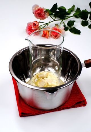 Shea butter, waxes, and oils for rose lip balm
