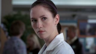 Lexie looking angry at Meredith after talking about her father.