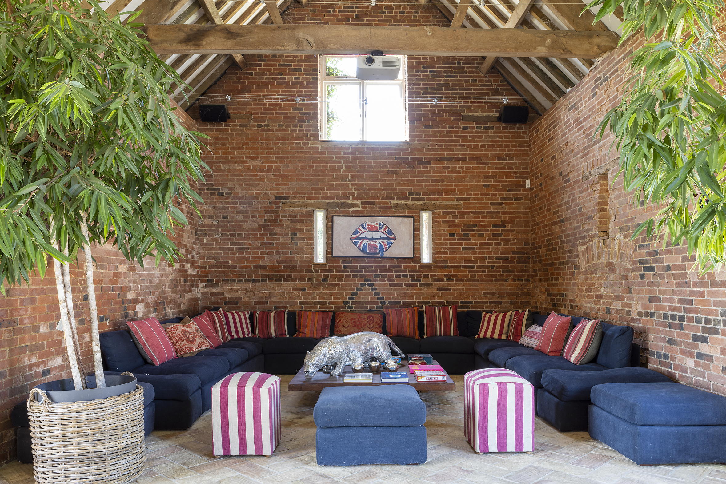 Mount Farm's 'party barn' with high beans and blue sofas