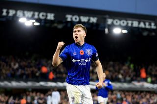 IPSWICH, ENGLAND - NOVEMBER 02: Leif Davis of Ipswich Town celebrates scoring his team's first goal during the Premier League match between Ipswich Town FC and Leicester City FC at Portman Road on November 02, 2024 in Ipswich, England. (Photo by Stephen Pond/Getty Images)