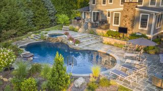 swimming pool on a sloping plot in an American backyard