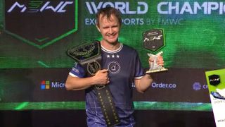 Microsoft Excel World Championships 2025 winner holding the prize and belt
