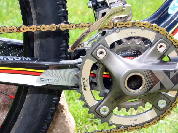 A metal plate helps prevent frame damage in the event of chainsuck.