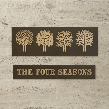 Sign on wall reading The Four Seasons