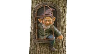 Bits and Pieces 12-inch elf out the door tree hugger