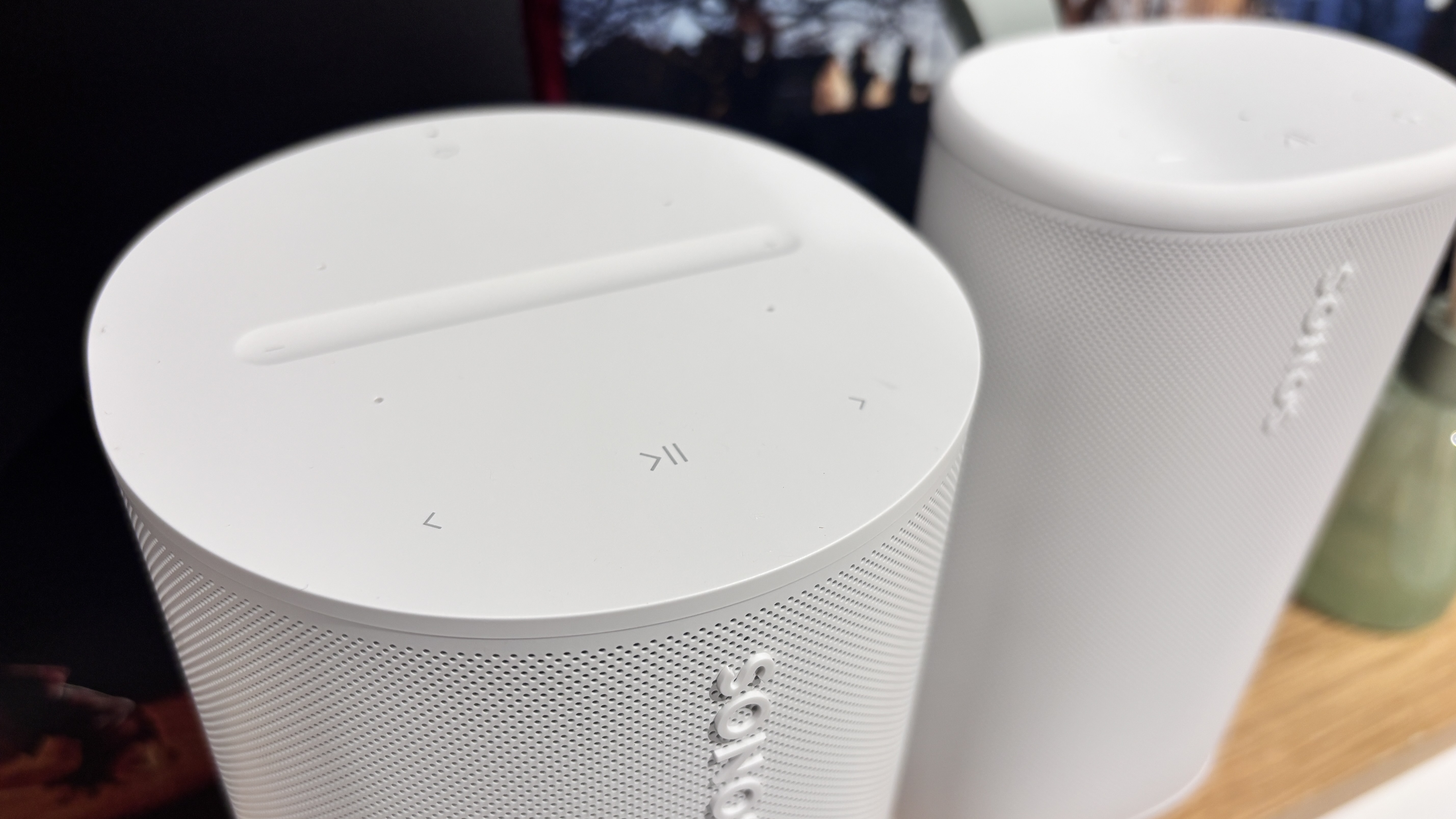 Sonos Era 100 vs Sonos Play wireless speakers in white side by side