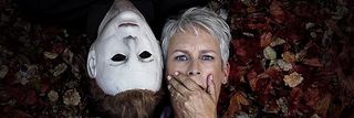 Halloween (2018) Jamie Lee Curtis Laurie Strode and Michael Myers head to head in the leaves